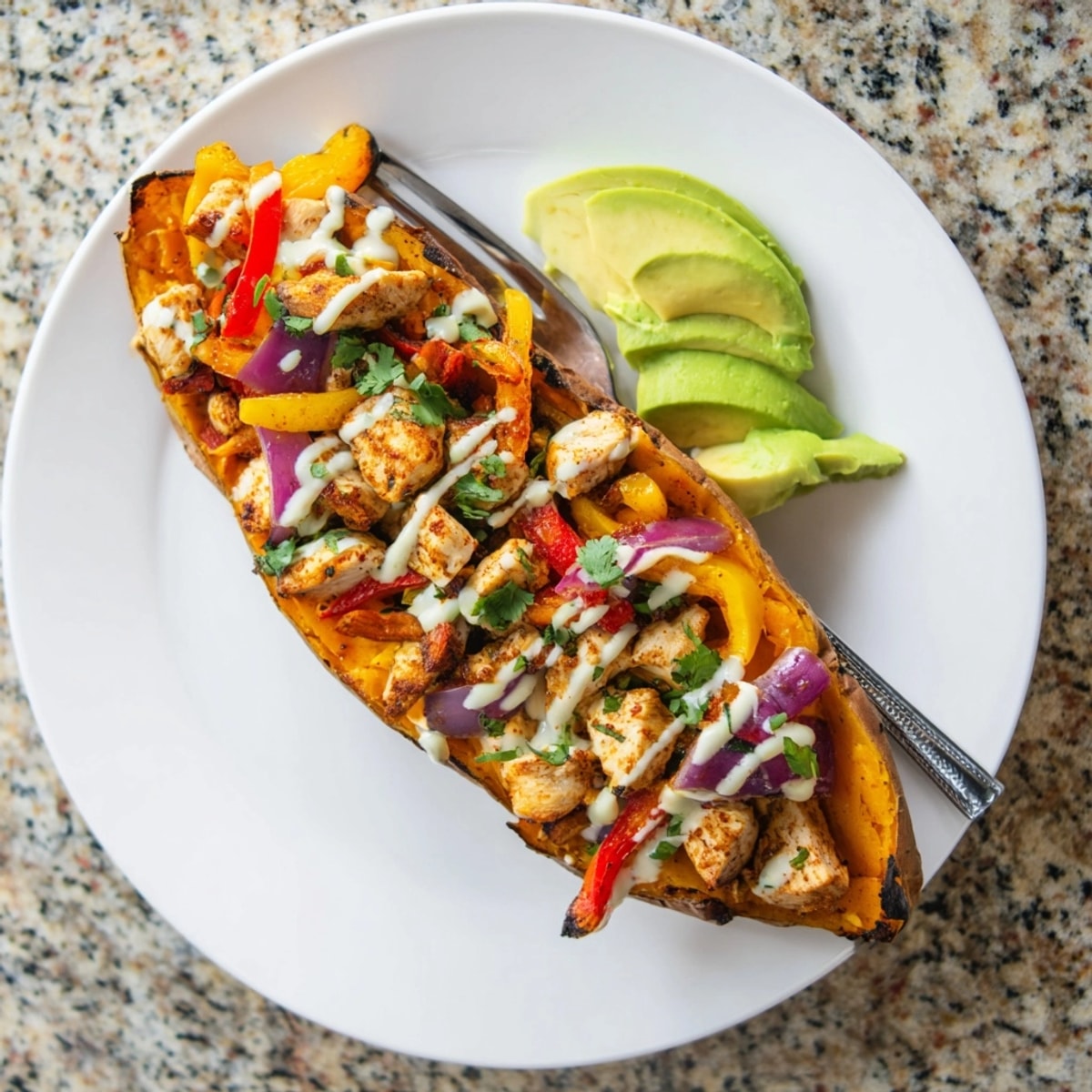 Golden-brown Cajun Chicken Sweet Potato Boats, filled high, drizzled, ready to eat.