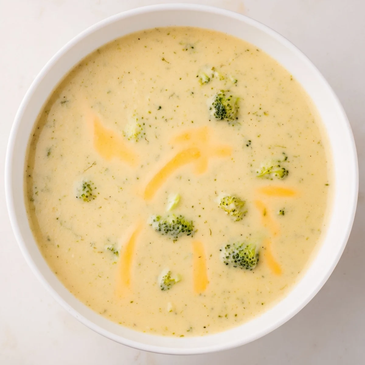 Creamy, homemade Broccoli Cheese Soup: full of tender broccoli florets and sharp cheddar flavor.