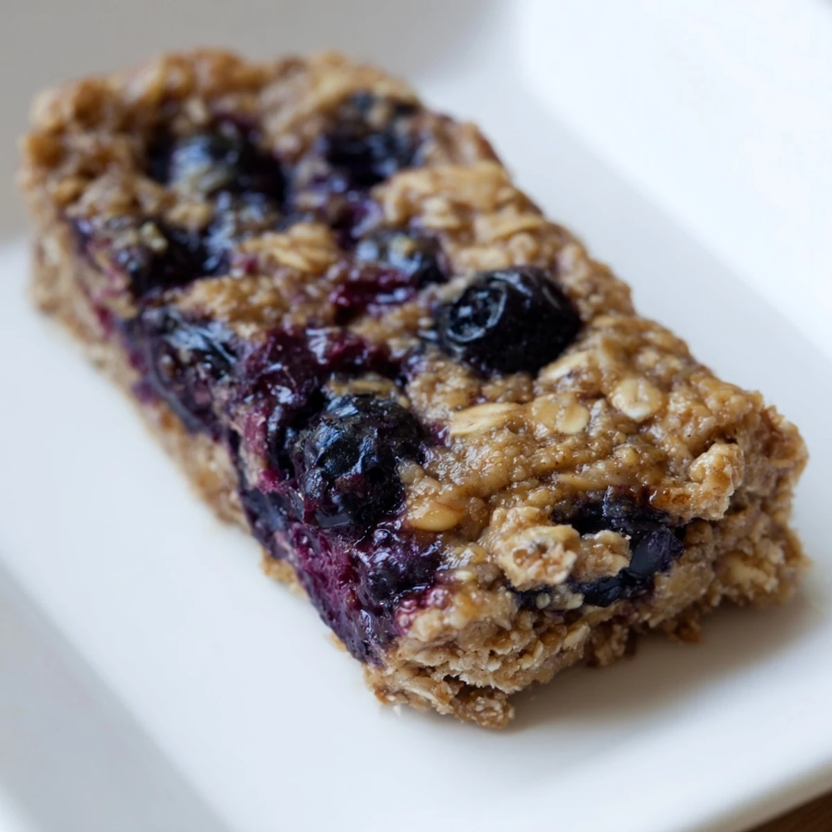 A tray of delicious Blueberry Banana Oatmeal Protein Bars, perfect for a quick breakfast.