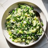 Fresh, vibrant Green Goddess Cabbage Dip, perfect for dipping tortilla chips, is cool and refreshing.