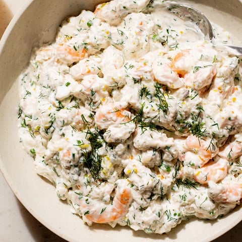 Creamy Shrimp Dill Yogurt Dip with freshly chopped herbs, chilled and ready to serve.