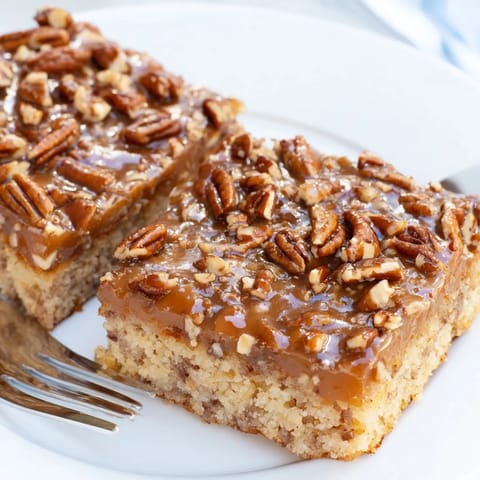 Scrumptious caramel pecan cookie sheet cake, perfect for family gatherings or celebrations.  