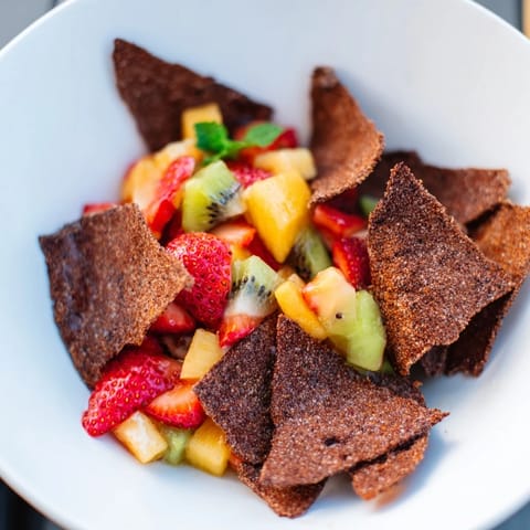 Sweet chocolate chips and colorful fruit salsa make a fun twist on dessert classic.  