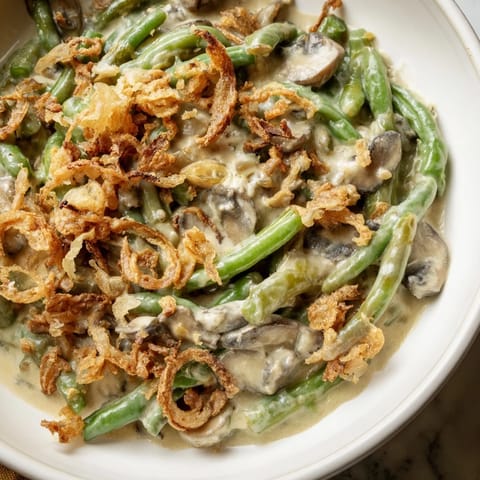 Delicious Old-School Green Bean Casserole: tender green beans in a rich mushroom sauce.  