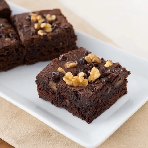 Warm, gooey sweet potato brownies fresh from the oven, offering a delightful blend of textures and flavors.