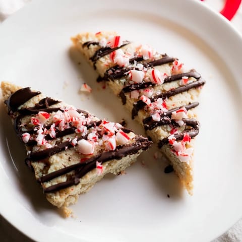 A close-up of delicious Chocolate Peppermint Shortbread Wedges, perfectly cut and ready to serve.
