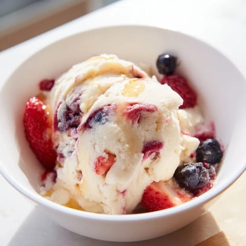 Scoopable cottage cheese ice cream served in a bowl, a refreshing, protein-packed treat.