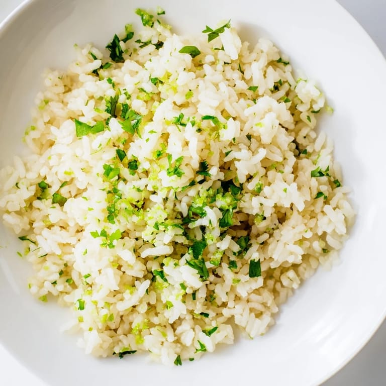 Vibrant Cilantro Lime Rice, cooked to perfection, showcasing fresh herbs and a hint of lime.