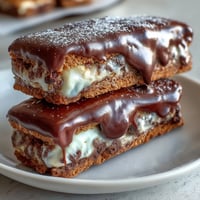 Decadent clotted cream cookie bars with white chocolate chunks, perfectly soft and rich for dessert lovers.  