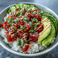 Spicy Tuna Pickle Rice Bowls with colorful toppings, a quick weeknight meal.
